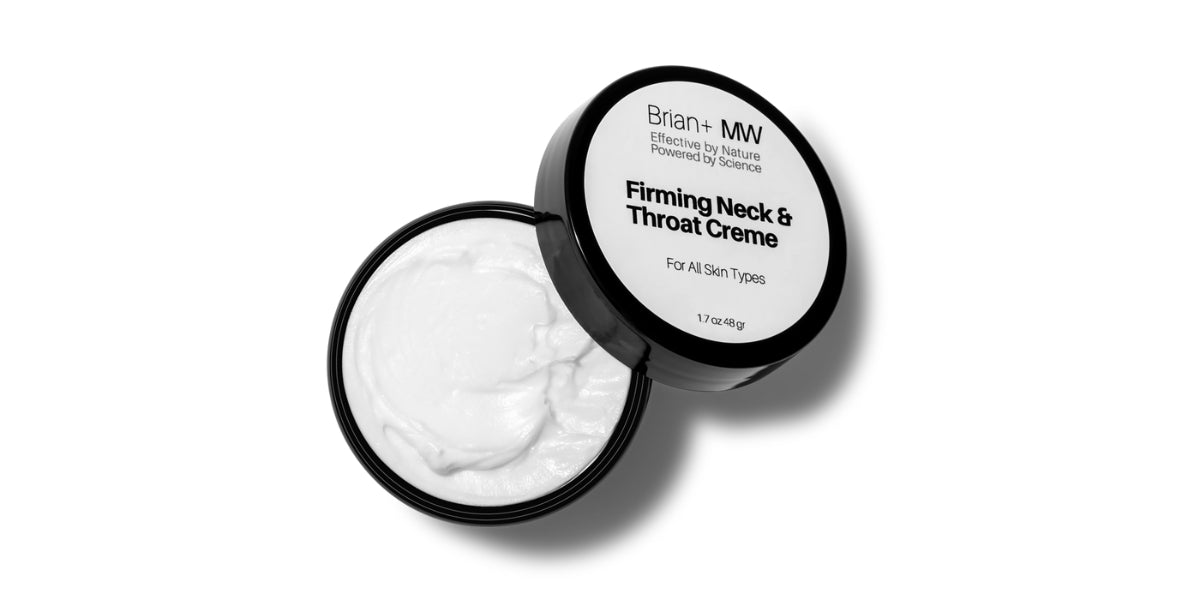 Firming Neck and Chest Creme is a white cream in a brown jar on a white background